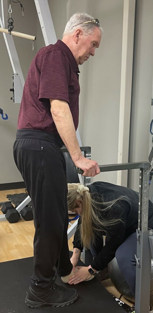 Dallas undergoing physical therapy at EA